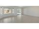 Bright living room featuring tile floors and backyard access at 6934 W Mclellan Rd, Glendale, AZ 85303