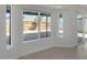Spacious living area with large windows and backyard views at 6934 W Mclellan Rd, Glendale, AZ 85303