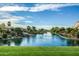 Peaceful lake with ducks and waterfront homes at 731 E Las Colinas Pl, Chandler, AZ 85249