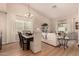 Open living and dining area with light flooring and neutral color palette at 731 E Las Colinas Pl, Chandler, AZ 85249