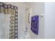 Clean bathroom with tub and shower, and a decorative shower curtain at 8865 E Baseline Rd # 1106, Mesa, AZ 85209