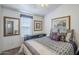 Cozy bedroom with a double bed and decorative pillows at 8865 E Baseline Rd # 1106, Mesa, AZ 85209