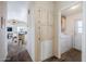 Hallway with linen closet and laundry room access at 8865 E Baseline Rd # 1106, Mesa, AZ 85209