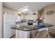 Kitchen features a breakfast bar and modern appliances at 8865 E Baseline Rd # 1106, Mesa, AZ 85209