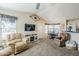 Open living space with comfortable seating, TV, and fireplace at 8865 E Baseline Rd # 1106, Mesa, AZ 85209