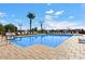Large community pool with plenty of lounge chairs at 8865 E Baseline Rd # 1106, Mesa, AZ 85209
