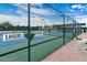 Well-maintained tennis courts with chain-link fence at 8865 E Baseline Rd # 1106, Mesa, AZ 85209