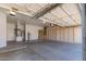 Large garage with ample storage cabinets and space for multiple cars or projects at 10417 E Champagne Dr, Sun Lakes, AZ 85248