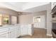 Modern kitchen with stainless steel appliances, and a breakfast bar at 10417 E Champagne Dr, Sun Lakes, AZ 85248