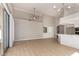Bright open floor plan with dining area and pass-through to the kitchen at 10417 E Champagne Dr, Sun Lakes, AZ 85248