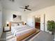 Main bedroom with ensuite bathroom and neutral decor at 10958 E Secret Mine Ct, Gold Canyon, AZ 85118