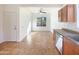 Bright dining area with tile floors and ceiling fan at 10958 E Secret Mine Ct, Gold Canyon, AZ 85118