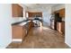 Kitchen with stainless steel appliances and wood cabinets at 10958 E Secret Mine Ct, Gold Canyon, AZ 85118