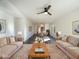 Bright living room featuring hardwood floors and neutral colors at 10958 E Secret Mine Ct, Gold Canyon, AZ 85118