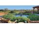 Landscaped courtyard with circular fountain and seating at 12128 W Desert Mirage Dr, Peoria, AZ 85383