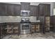 Well-equipped kitchen with pull-out shelves at 12128 W Desert Mirage Dr, Peoria, AZ 85383