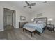 Main bedroom with plush bedding and large windows at 12128 W Desert Mirage Dr, Peoria, AZ 85383