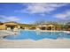 Community pool with cabanas and seating areas at 12128 W Desert Mirage Dr, Peoria, AZ 85383