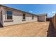 A spacious backyard and exterior of a home, ready for outdoor enjoyment at 12358 W Marguerite Ave, Avondale, AZ 85323