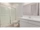 Bright bathroom featuring a new shower, vanity, and fixtures at 12358 W Marguerite Ave, Avondale, AZ 85323