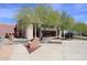 Community center building with landscaping and art at 15709 E Palisades Blvd, Fountain Hills, AZ 85268