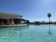 Inviting community pool with lounge chairs and patio area at 17200 W Bell Rd # 641, Surprise, AZ 85374