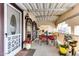 Covered patio with seating area and potted plants at 17200 W Bell Rd # 641, Surprise, AZ 85374