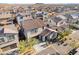 Aerial view of a house and surrounding neighborhood, showcasing the community and landscape at 17755 W Jojoba Rd, Goodyear, AZ 85338