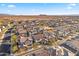 Aerial view of a residential neighborhood with desert landscape at 17755 W Jojoba Rd, Goodyear, AZ 85338
