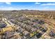 Aerial view of a residential neighborhood with houses and streets at 17755 W Jojoba Rd, Goodyear, AZ 85338