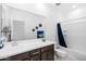 Bathroom with double vanity and shower/tub combo at 17755 W Jojoba Rd, Goodyear, AZ 85338