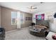 Round bed in spacious bedroom with large window at 17755 W Jojoba Rd, Goodyear, AZ 85338