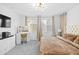 Main bedroom featuring a cozy atmosphere and large windows at 17755 W Jojoba Rd, Goodyear, AZ 85338
