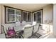 Covered patio with table and chairs, ideal for outdoor dining at 17755 W Jojoba Rd, Goodyear, AZ 85338