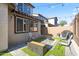 Cozy patio with seating area and fire pit at 17755 W Jojoba Rd, Goodyear, AZ 85338