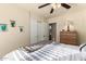 Serene bedroom with closet and natural light at 1880 E Desert Rose Trl, San Tan Valley, AZ 85143