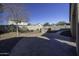 Backyard with built-in grill and paved patio at 20948 N Sansom Dr, Maricopa, AZ 85138