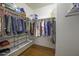 Spacious walk-in closet with ample shelving and hanging space at 20948 N Sansom Dr, Maricopa, AZ 85138
