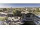 Community clubhouse with pool and patio area at 20948 N Sansom Dr, Maricopa, AZ 85138