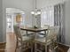 Small dining area with a square table and four chairs at 20948 N Sansom Dr, Maricopa, AZ 85138