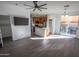 Dining area with gray flooring and access to the backyard at 2208 N 78Th Gln, Phoenix, AZ 85035