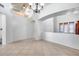 Two-story entryway with tile floors and views to the living room at 225 N 236Th Ave, Buckeye, AZ 85396
