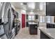 Kitchen with stainless steel appliances and granite countertops at 225 N 236Th Ave, Buckeye, AZ 85396