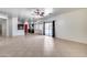 Bright and spacious living room with tile floors and access to backyard at 225 N 236Th Ave, Buckeye, AZ 85396