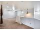 Spacious loft area with carpet and ceiling fan at 225 N 236Th Ave, Buckeye, AZ 85396