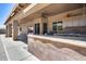 Outdoor kitchen with granite countertop and appliances at 225 N 236Th Ave, Buckeye, AZ 85396