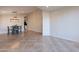 Dining area with dark gray table and chairs, and view of kitchen at 2319 E Williams Dr, Phoenix, AZ 85024