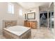 Bathroom with large soaking tub and double sinks at 2614 W Florimond Rd, Phoenix, AZ 85086