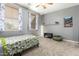 Cozy bedroom with twin bed, window coverings, and fun decor at 2614 W Florimond Rd, Phoenix, AZ 85086