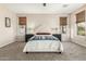 Spacious bedroom with carpeted floors and natural light at 2614 W Florimond Rd, Phoenix, AZ 85086